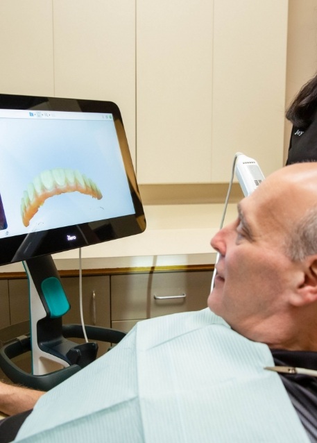 Dental patient having digital impressions of their teeth taken