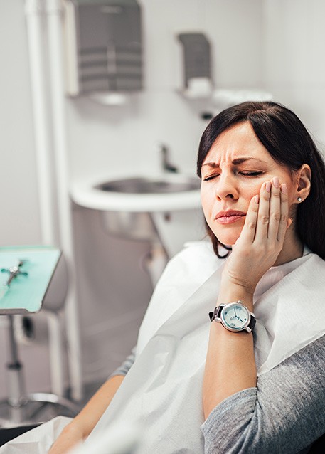 Closeup of woman experiencing toothache