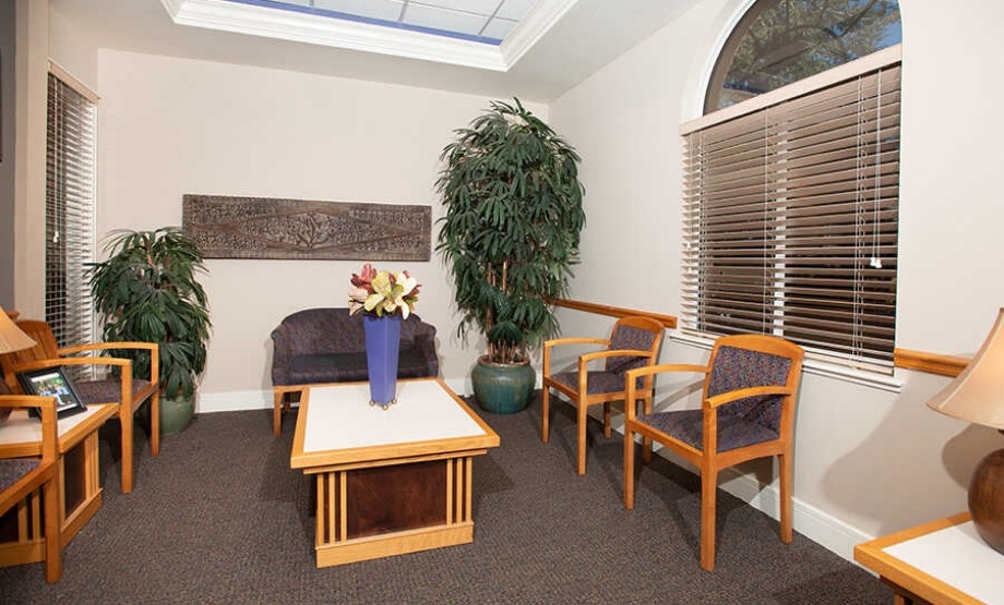 Waiting area with wooden chairs
