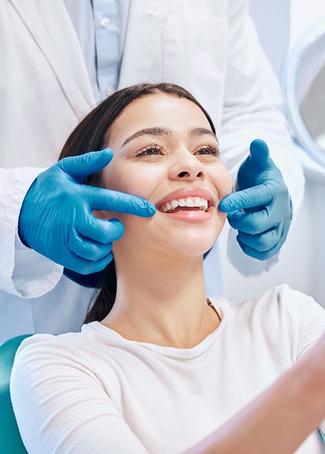 Nose-to-chin closeup of woman’s bright smile